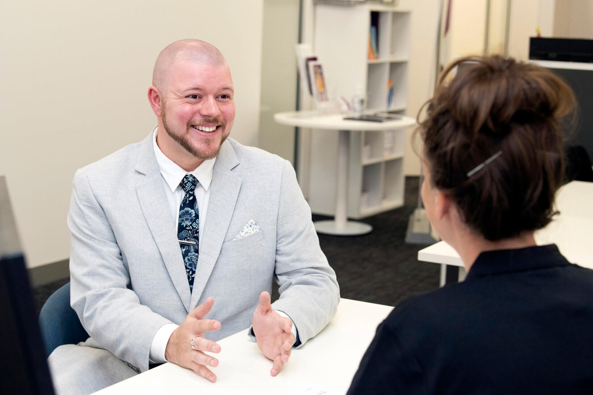 Mitchell discussing with a client