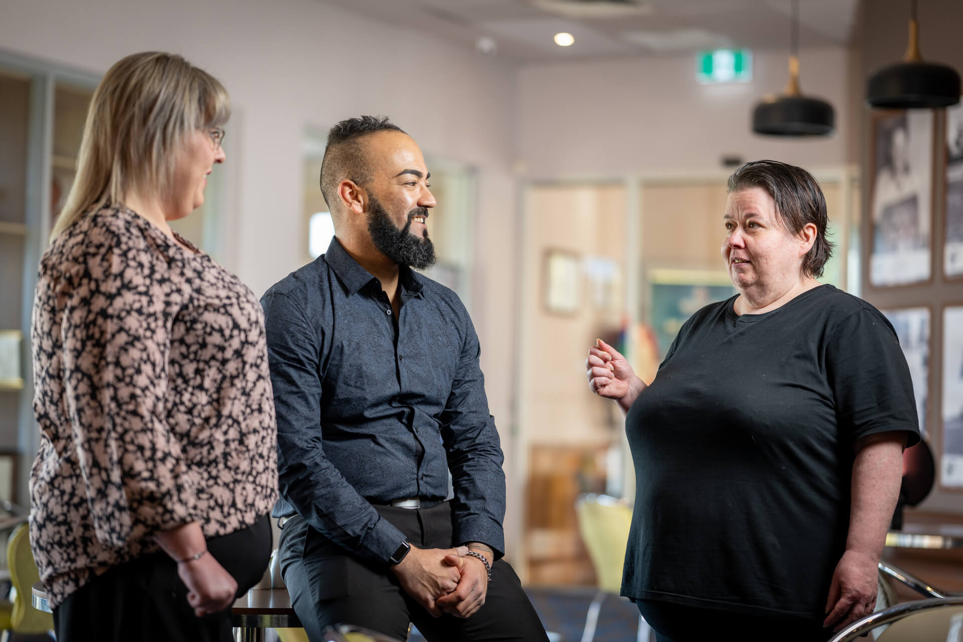 Melissa discussing with colleagues